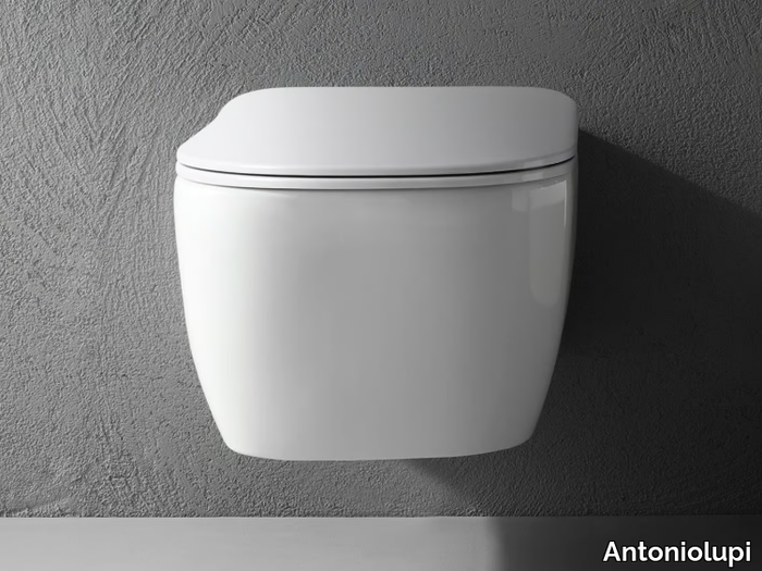 KOMODO - Wall-hung ceramic toilet _ Antoniolupi