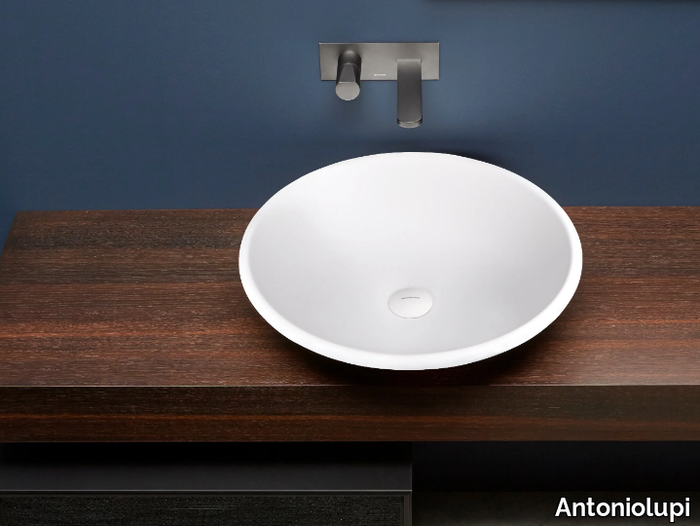 RIM - Countertop round Flumood® washbasin _ Antoniolupi