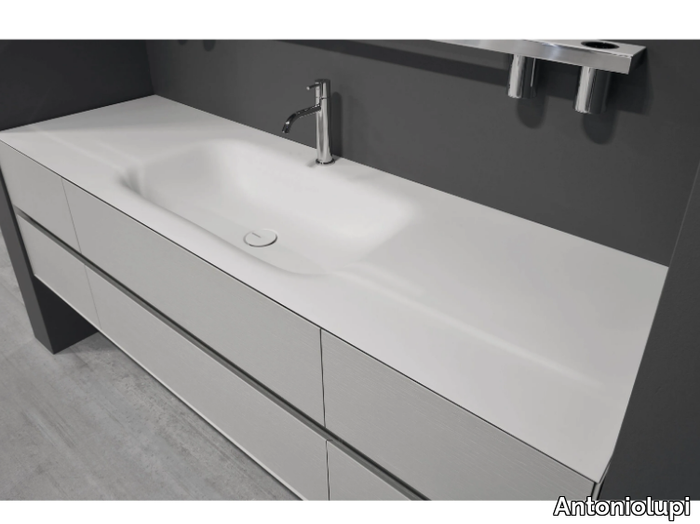 SEGNO - Corian® washbasin with integrated countertop _ Antoniolupi