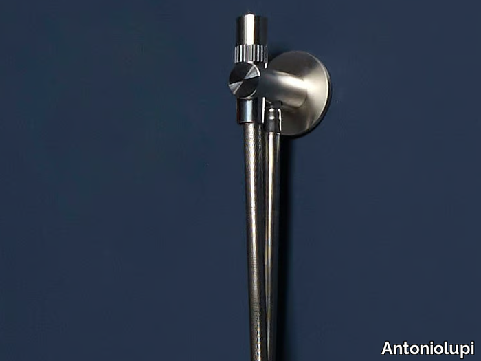 VIBRO - Wall-mounted brushed steel handshower with hose _ Antoniolupi