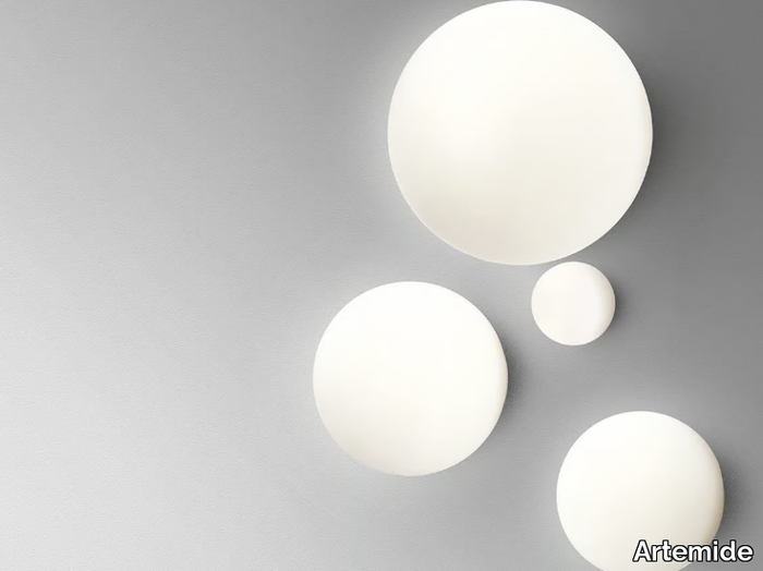 DIOSCURI - Halogen blown glass wall lamp _ Artemide