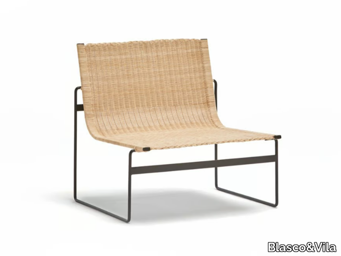 FORMENTOR - Sled base rattan easy chair _ Blasco&Vila