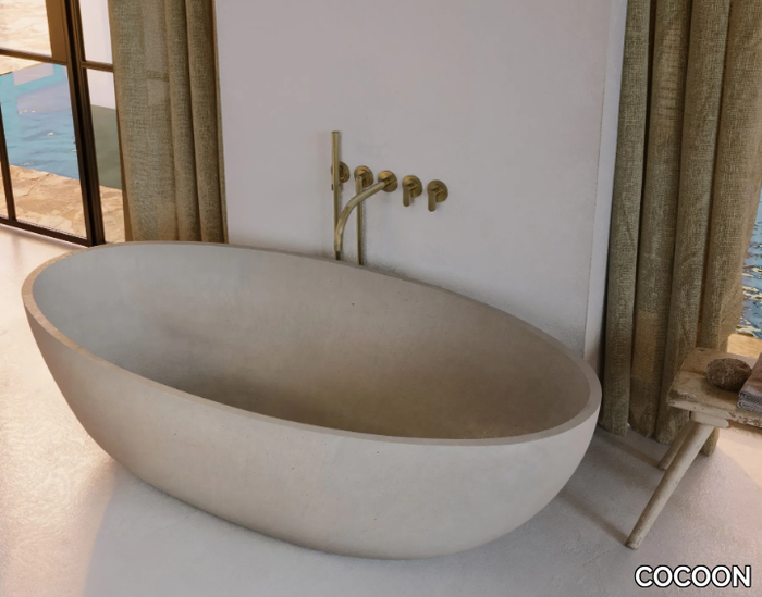 ATLANTIS - Freestanding oval Solid Surface bathtub _ COCOON