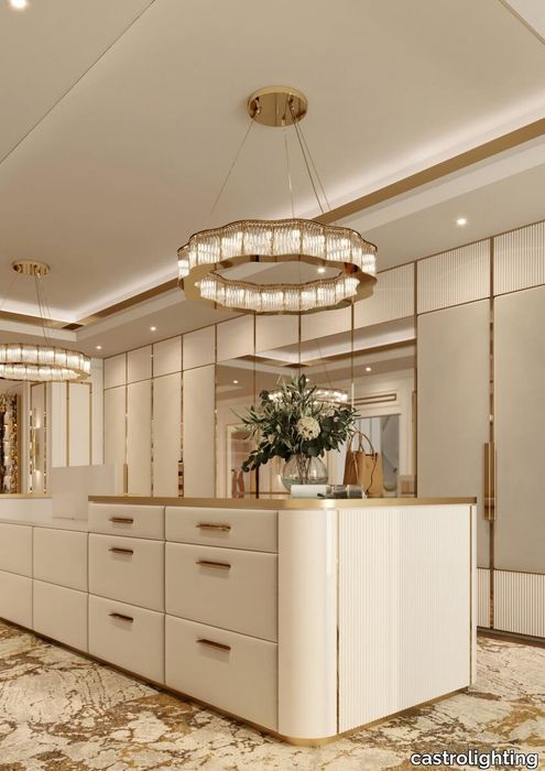 Castro-Lighting-Interiors-Modern-Grandiose-Mediterranean-Walk-In-Closet-Cosmopolitan-Round-Suspension-Luxurious-Sophisticated-Marble-Tones-Space.jpg