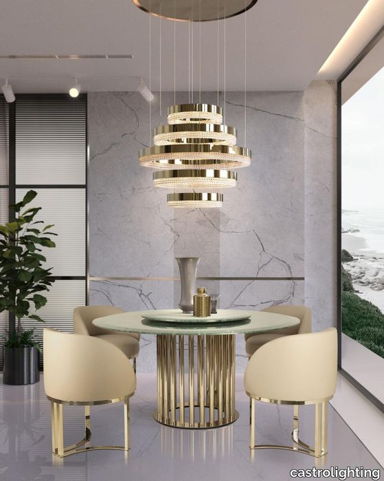 Castro_Lighting_modern_condo_dining_room_design_Charlotte_Ring_Dining_Table_Susan_chair_web.jpg