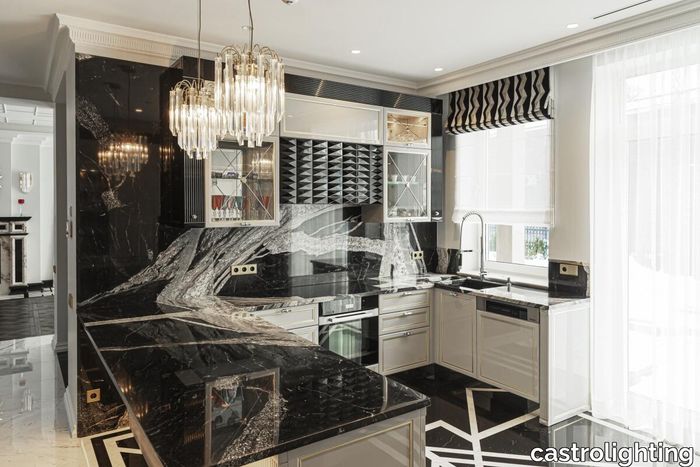 Opulent_Residence_in_Lithuania_black_marble_kitchen_feat_lotus_pendant.jpg