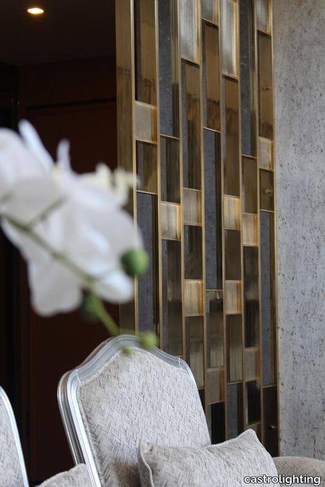 living-room-matisse-wall-divider-gold-platted-brass.JPG