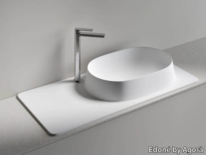 CALDERA - Oval countertop washbasin with integrated countertop _ Edoné by Agorà