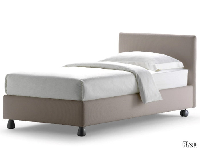 NOTTURNO - Upholstered bed on castors _ Flou