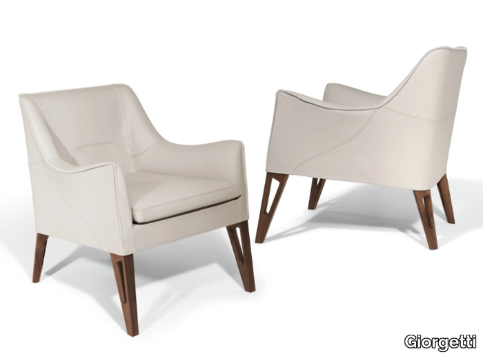 MOBIUS - Leather easy chair with armrests _ Giorgetti