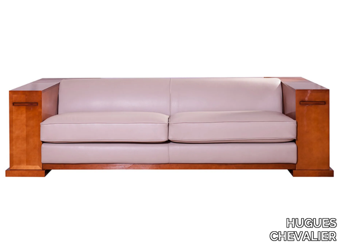 KEY LARGO - Contemporary style leather sofa with integrated magazine rack _ HUGUES CHEVALIER