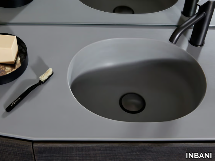 GIRO - Oval single Solid Surface washbasin with integrated countertop _ INBANI