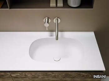 OVALO - Corian® washbasin with integrated countertop _ INBANI