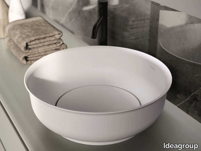 NICOLE - Round countertop single composite material washbasin _ Ideagroup