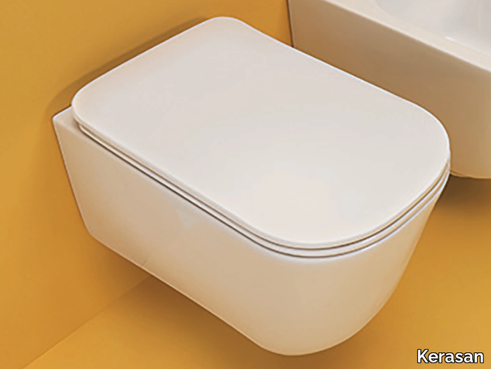 TRIBECA 5114 - Wall-hung rimless ceramic toilet _ Kerasan