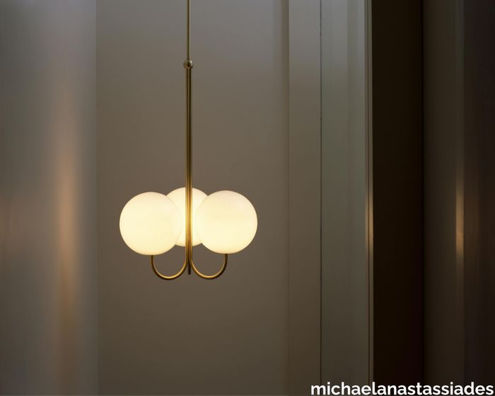 7b870f81-d0d6-47d5-8f2c-d0caf587c671_2-michaelanastassiades-tripleangle-brass.jpg