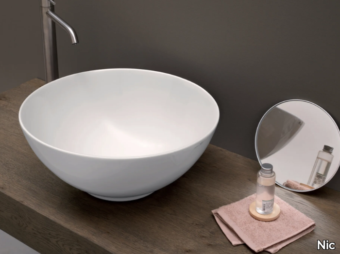 FLAVIA - Countertop round ceramic washbasin _ Nic