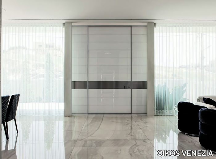 SYNUA - Pivot Laminam® entry door _ OIKOS VENEZIA