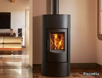 E530 T STEEL - Wood-burning wall-mounted steel stove for air heating _ Piazzetta