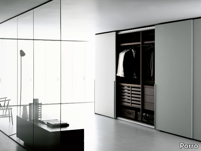 STORAGE SLIDING - Sectional wardrobe with sliding doors custom _ Porro