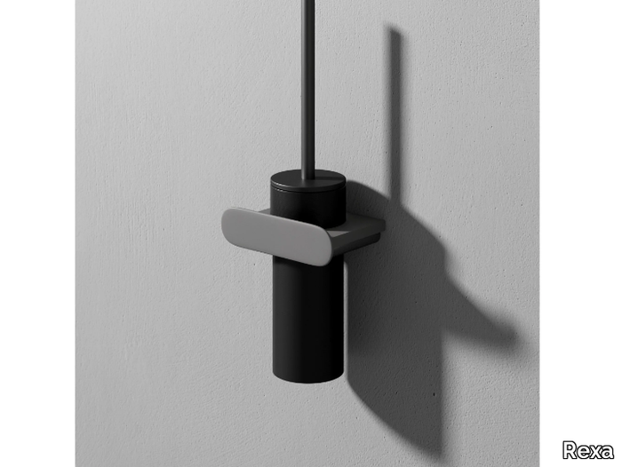 MOON - Wall-mounted Corian® toilet brush _ Rexa