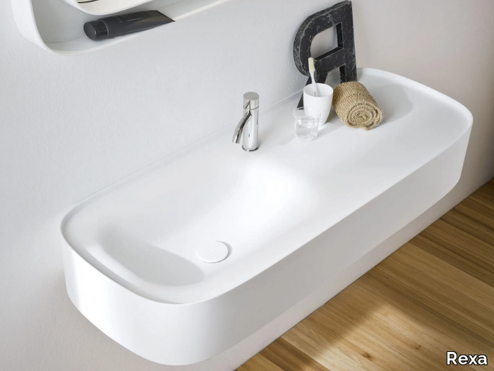 FONTE - Wall-mounted Corian® washbasin with integrated countertop _ Rexa