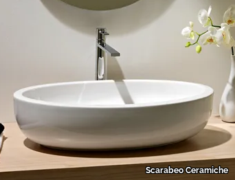 PLANET - Countertop oval ceramic washbasin _ Scarabeo Ceramiche