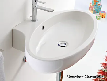 PLANET - Wall-mounted oval ceramic washbasin _ Scarabeo Ceramiche