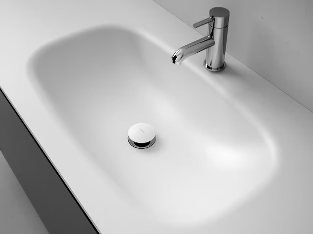 G1 - Corian® washbasin with integrated countertop _ INBANI