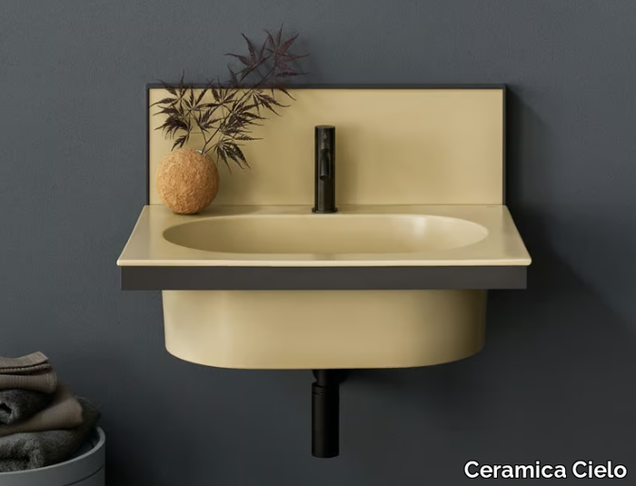 ELLE OVALE - Wall-mounted single oval ceramic washbasin _ Ceramica Cielo