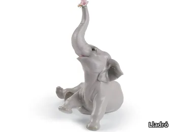 BABY ELEPHANT WITH PINK FLOWER - Porcelain decorative object _ Lladró