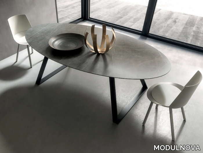 BLADE - Oval porcelain stoneware dining table _ MODULNOVA