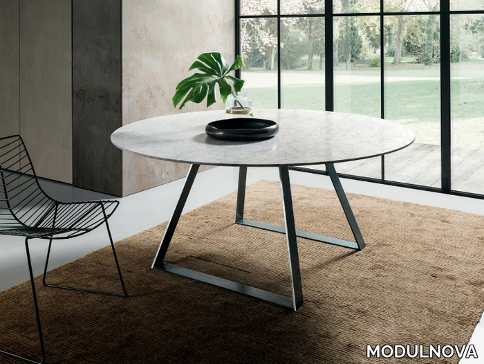 BLADE - Round porcelain stoneware dining table _ MODULNOVA